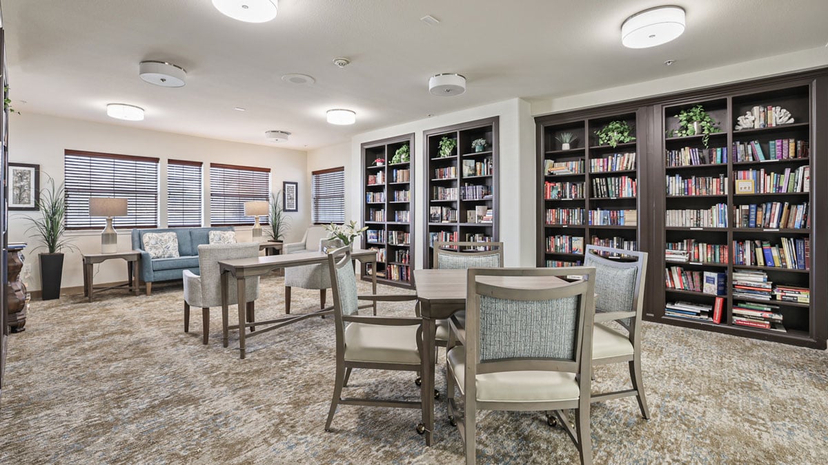 The library at Salishan with shelves of books and comfortable seating