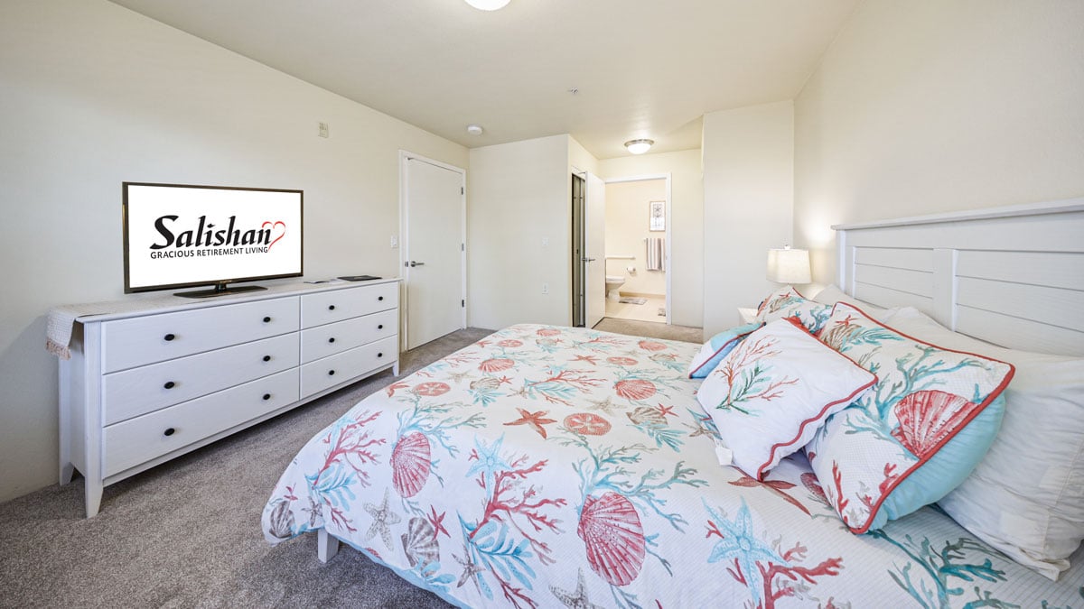 A furnished bedroom in a Salishan apartment